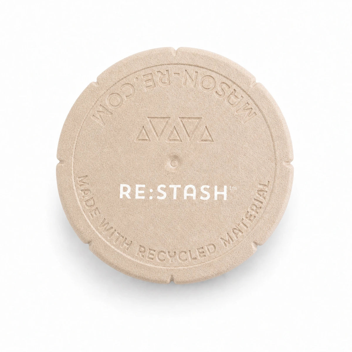 Beiger Außendeckel des RE:STASH Jars mit RE:STASH-Prägung