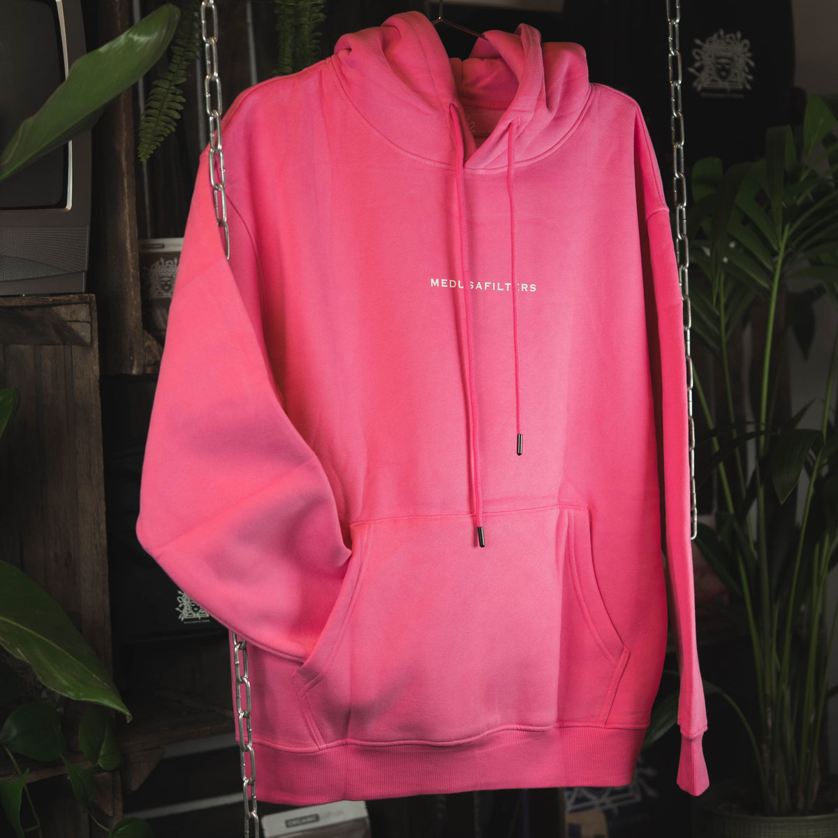 Medusafilters Hoodie Rosé am Bügel, Vorderseite